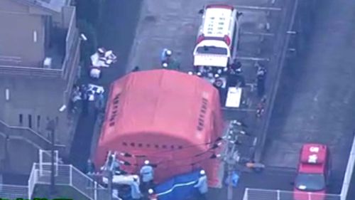A still image taken from aerial vision purpoting to show the scene outside the centre in Sagamihara. (Image: NHK)