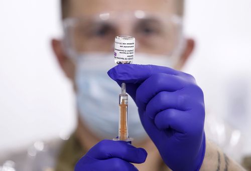 Sgt Phil Morris, Regimental Aid Post 4th Battalion Royal Regiment of Scotland, prepares the Oxford/AstraZeneca coronavirus vaccine ahead of being administered to patients at the Elland Road vaccination centre in Leeds. Picture date: Monday February 8, 2021. PA Photo. See PA story HEALTH Coronavirus. Photo credit should read: Danny Lawson/PA Wire