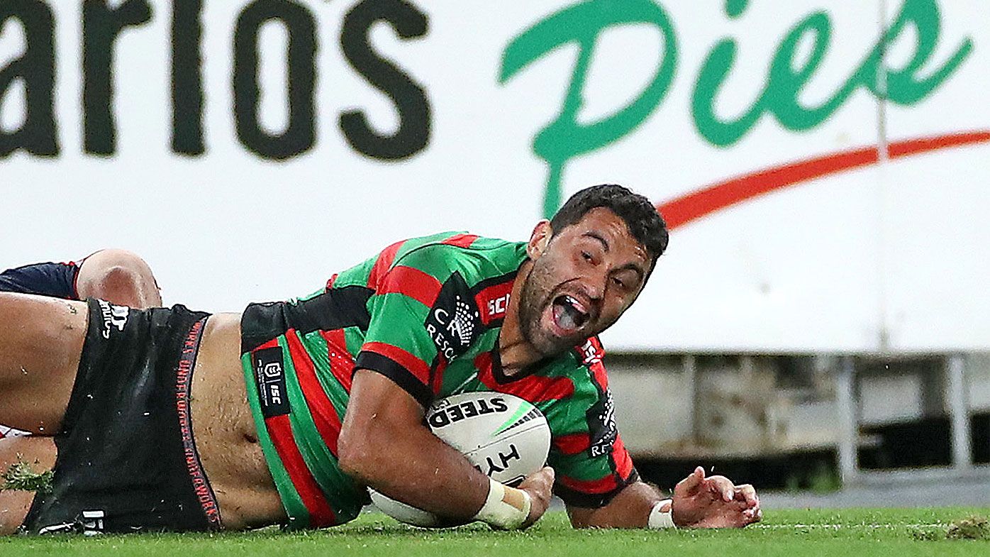 Alex Johnston of the Rabbitohs scores a try 
