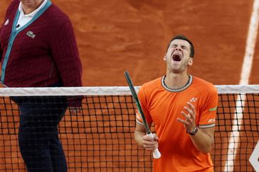 French Open 2024: Hubert Hurkacz reacts after the ball was adjudged to be ruled out by the umpire; Hubert Hurkacz V Grigor Dimitrov.
