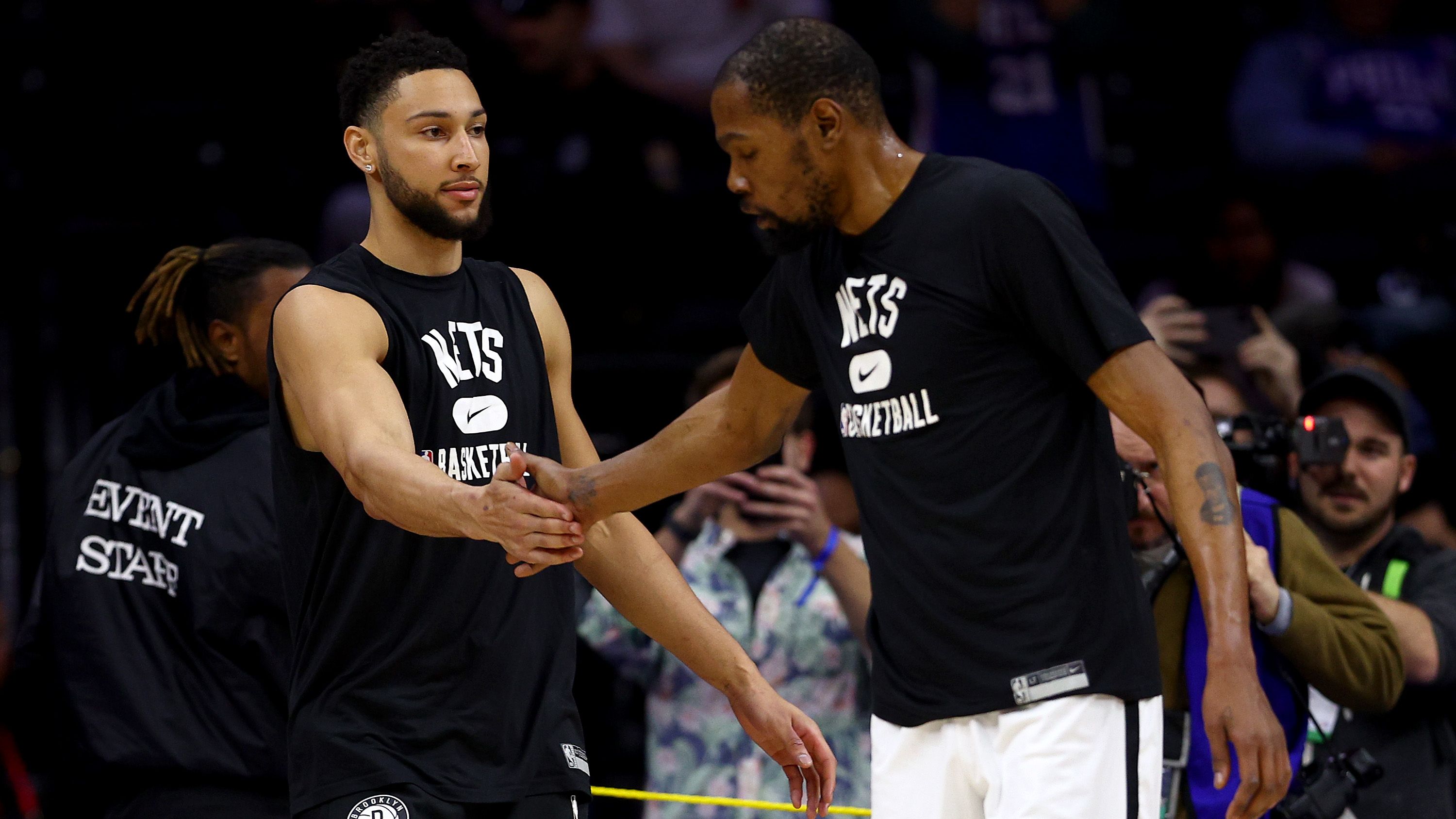 Ben Simmons and Kevin Durant of the Brooklyn Nets greet each other during warm ups before the game against the Philadelphia 76ers.