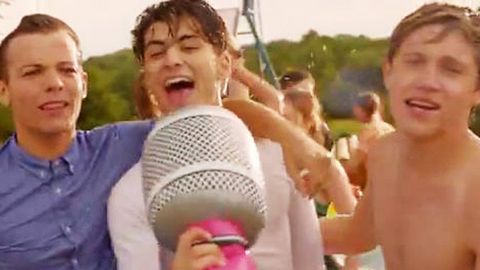 Stop everything! One Direction get wet and shirtless in 'Live While We're Young' clip