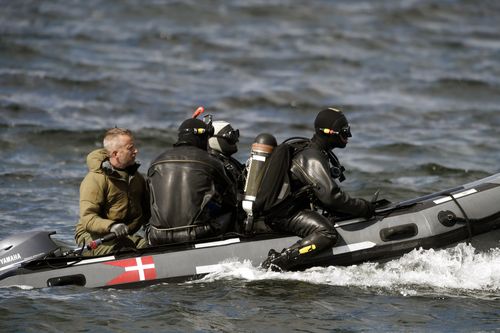 Divers from the Danish Defence Command prepare for a dive in Denmark last year where the torso of Kim Wall was found.