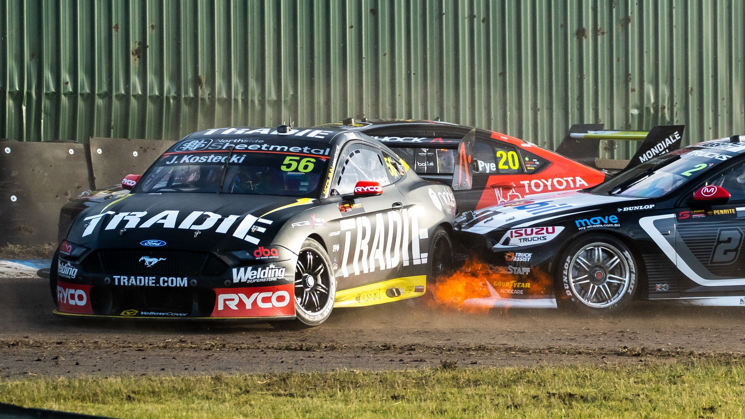 Jake Kostecki (No.56) is turned into a spin by Nick Percat (No.2) at Sandown.
