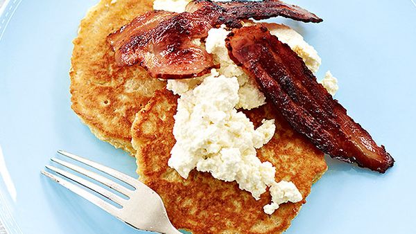 Big oat pancakes with crispy bacon and ricotta