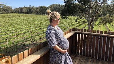 Amy Springhall shows off her baby bump.