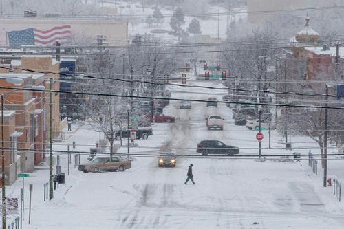 The system dumped about a foot of snow in the Dakotas, Nebraska and Minnesota by Friday morning (local time). It 