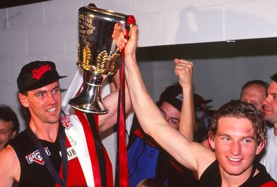 Hird pictured celebrating the '93 flag with Paul Salmon.