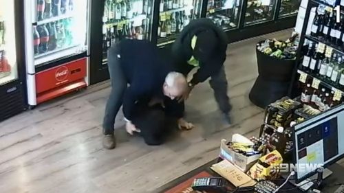 The 64-year-old grandfather managed to grab one of the men in a headlock as the others ran from the store.