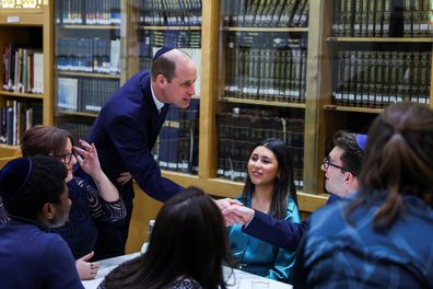 Prince William, Prince of Wales meets with young people, affected by anti-Semitism, together with Holocaust Educational Trust ambassadors during a visit to the Western Marble Arch Synagogue on February 29, 2024 in London 