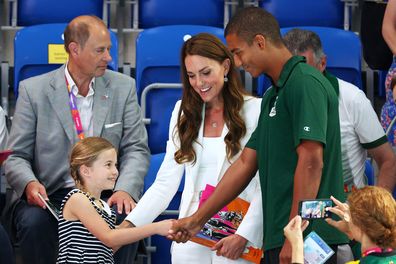 Princess Charlotte shakes hands with Warren Lawrence of Team Jamaica on day five of the Birmingham 2022 Commonwealth Games at Sandwell Aquatics Centre on August 02, 2022 in Smethwick, England 