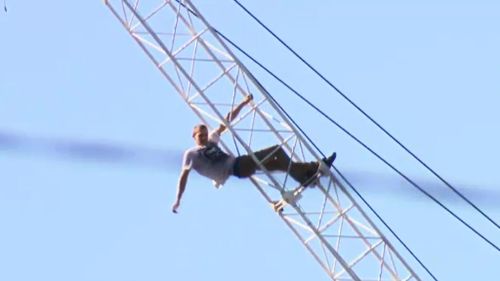 A man climbed a crane in a Woolloongabba construction site. (9NEWS)