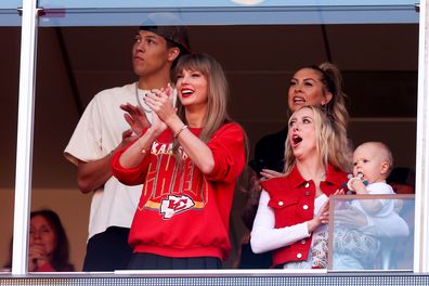 KANSAS CITY, MISSOURI - OCTOBER 22: Taylor Swift and Brittany Mahomes react during a game between the Los Angeles Chargers and Kansas City Chiefs at GEHA Field at Arrowhead Stadium on October 22, 2023 in Kansas City, Missouri. (Photo by Jamie Squire/Getty Images)