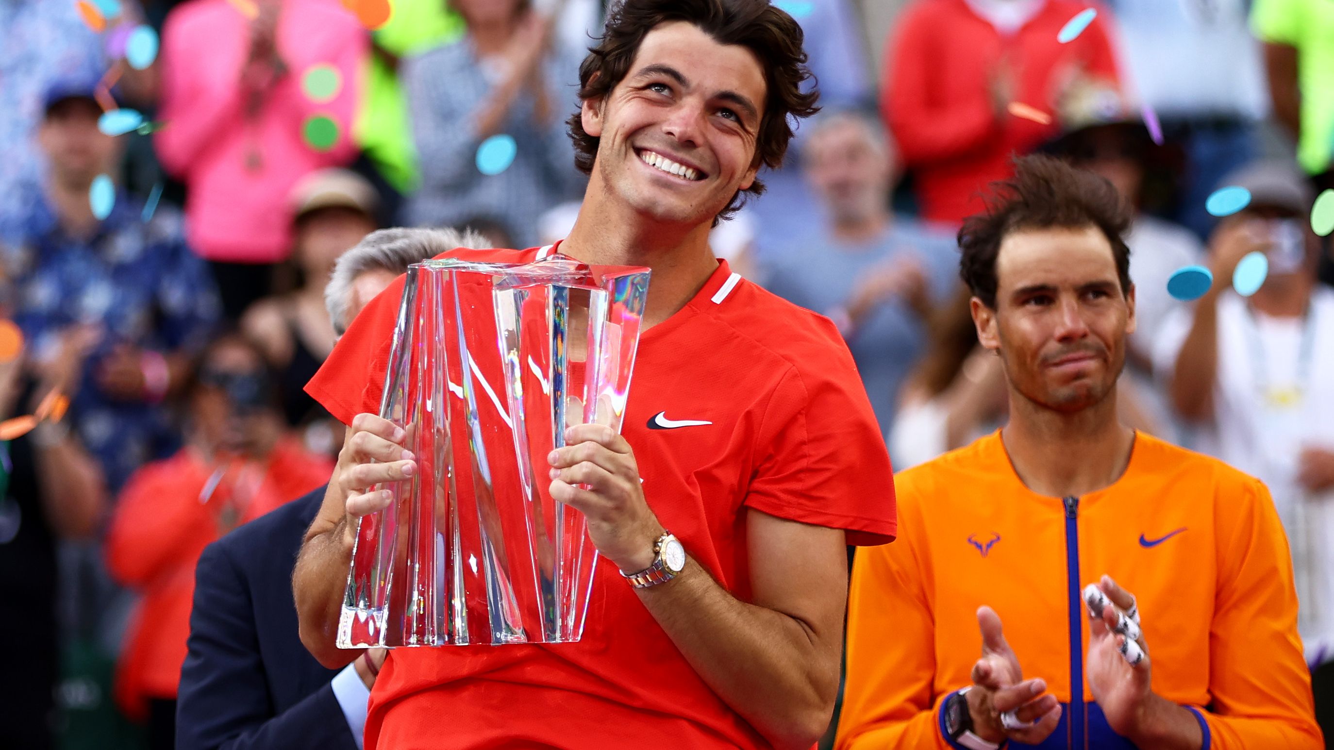 Taylor Fritz of the United States holds his trophy after his straight sets victory against Rafael Nadal of Spain in the men&#x27;s final of the BNP Paribas Open at Indian Wells.