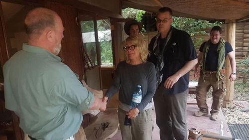 American tourist Kim Endicott (centre) following her rescue after being kidnapped by unknown gunmen in Uganda's Queen Elizabeth National Park. 