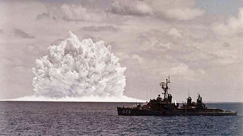 The USS Agerholm in the foreground of the Baker dome. (National Security Archive) 