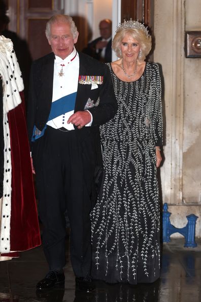 Queen Camilla listens to King Charles III addressing assembled guests at Mansion House in London, Wednesday, Oct. 18, 2023. Camilla is wearing the Girls of Great Britain and Ireland tiara and the South African diamond necklace and bracelet.