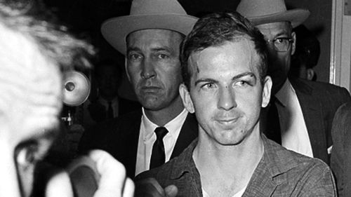 Lee Harvey Oswald at police headquarters in Dallas, Texas. (AAP)