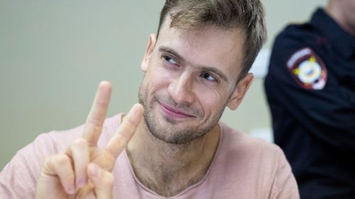 An anti-Kremlin activist lost his sight, hearing and ability to walk in a suspected poisoning last week but is doing better since he arrived in Berlin for treatment, two friends say.