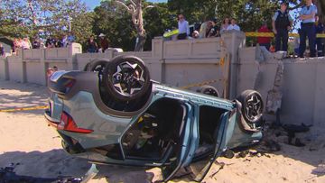 Car crashes onto Balmoral Beach