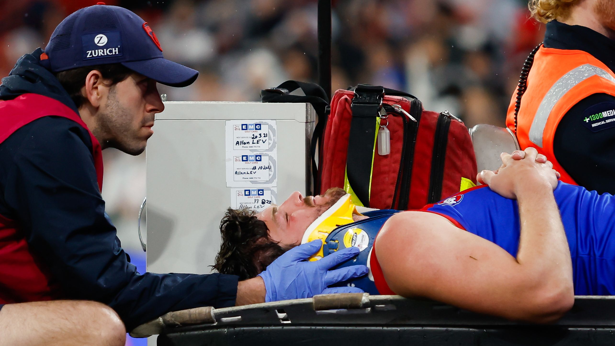 MELBOURNE, AUSTRALIA - SEPTEMBER 07: Angus Brayshaw of the Demons leaves the field on a stretcher during the 2023 AFL First Qualifying Final match between the Collingwood Magpies and the Melbourne Demons at Melbourne Cricket Ground on September 07, 2023 in Melbourne, Australia. (Photo by Dylan Burns/AFL Photos via Getty Images)