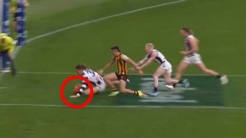 Replays show Darcy Moore geting to the ball first with Sam Butler subsequently falling onto him.