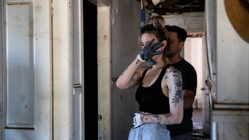 Emily Chave is overwhelmed by the destruction of her home in Woodburn, northern NSW.