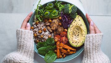 Healthy eating. Plate with vegan or vegetarian food. Healthy plant based diet. Healthy dinner. Buddha bowl with fresh vegetables. High quality photo