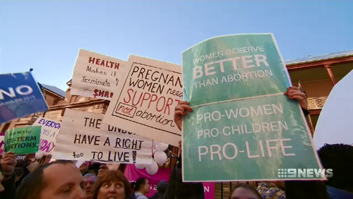 Protestors both for and against abortion gathered outside NSW parliament as the decriminalisation bill was discussed.
