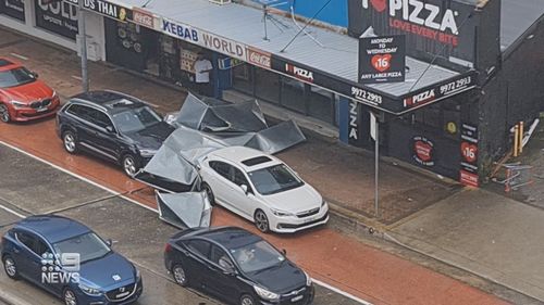 Part of an air conditioning unit smashed into a car on Pittwater Road in the storm on Sydney's Northern Beaches