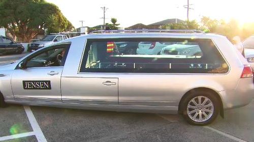 Aya's body arriving in a hearse before a memorial ceremony at a Dandenong Mosque.