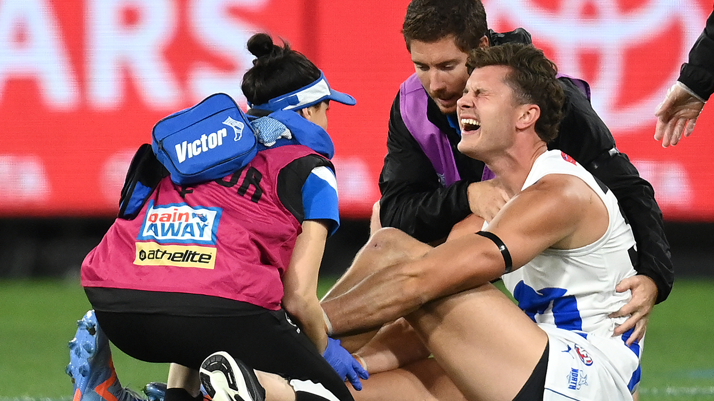 Kangaroos youngster Charlie Comben suffers 'horrible leg injury, taken to hospital in ambulance
