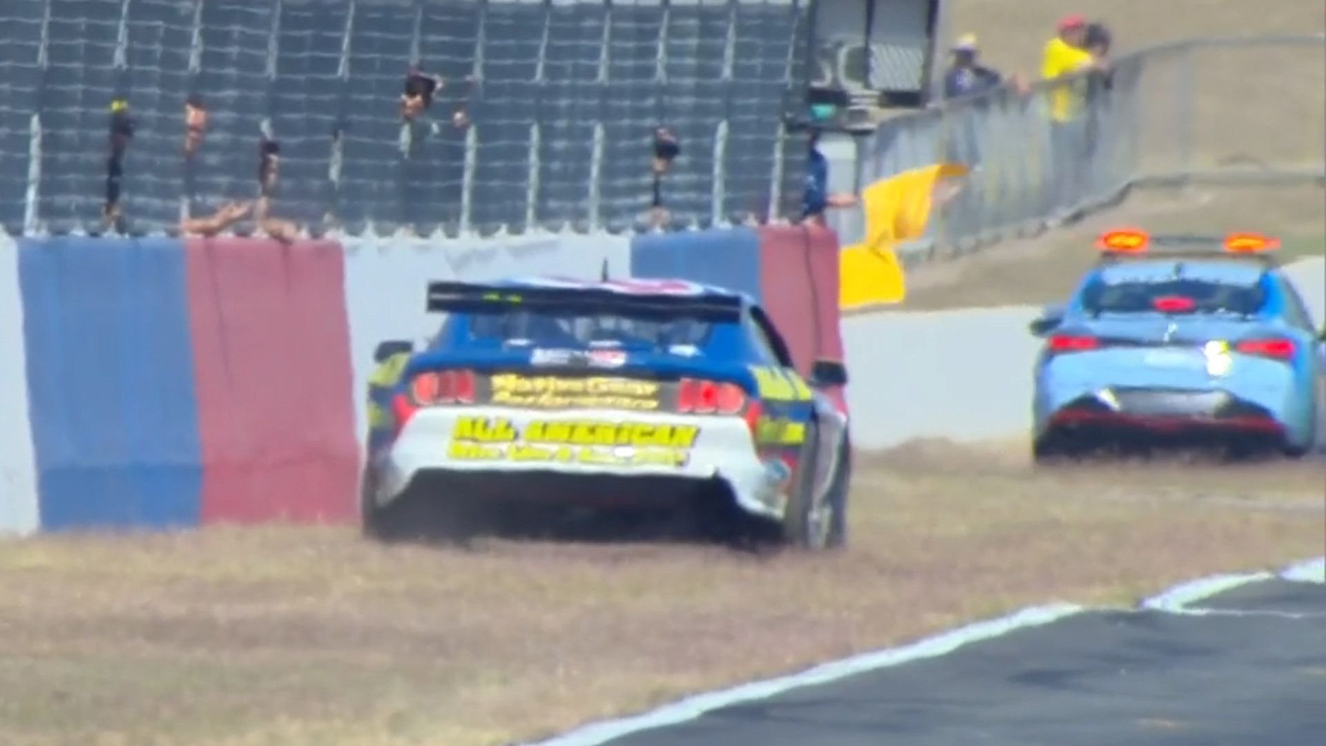 Ben Grice pulls his car onto the grass after driveline failed.