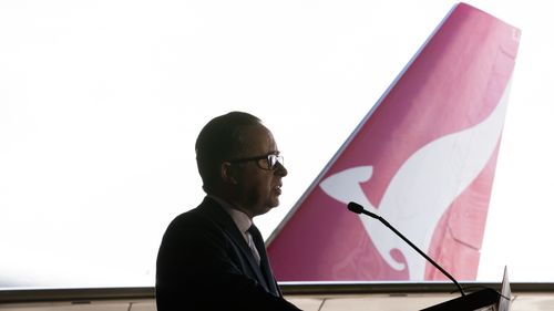 Then-Qantas CEO Alan Joyce at a lectern, 2020.