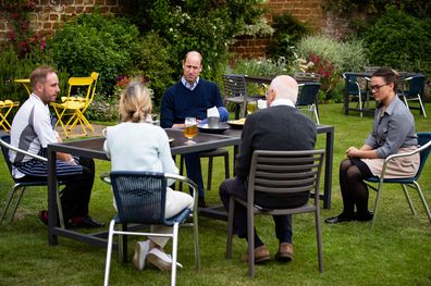 The Duke of Cambridge sat in the garden with owners, head chef and duty manager of The Rose & Crown.