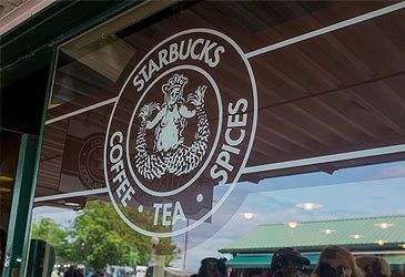 Which mythological being is featured in the Starbucks logo?