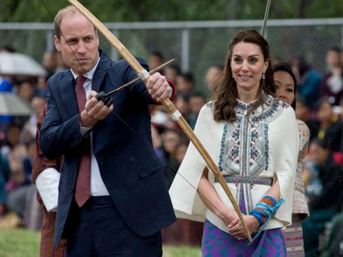 The royals failed to hit the target but still appeared to enjoy the experience. (AFP)
