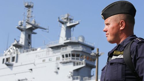 France delays delivery of Russian warship over Ukraine crisis