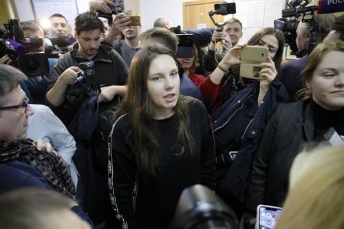 Alla Ilyina, who broke out of the hospital after learning that she would have to spend 14 days in isolation instead of the 24 hours doctors promised her, speaks to the Media in a courtroom in St.Petersburg.