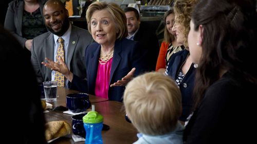 Hillary Clinton speaks to supporters at a cafe in Virginia. (AAP)