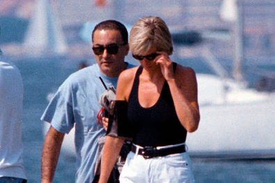 Diana, Princess of Wales and Dodi Fayed walk on a pontoon in the French Riviera resort of St. Tropez