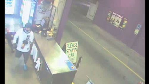 The man left with two bottle of alcohol following the attack. (Queensland Police)