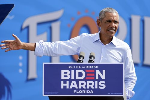 Former President Barack Obama speaks at a rally while campaigning for Democratic presidential candidate former Vice President Joe Biden.