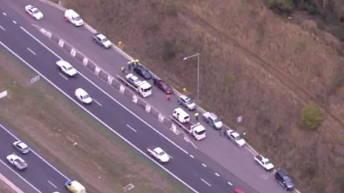Northbound traffic queued at least 12km on Sydney's M7 at Horsley Park after six-vehicle accident