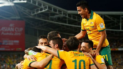 Socceroos through to Asian Cup quarter finals after trouncing Oman