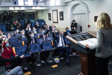 Reporters wearing face masks listen as White House press secretary Kayleigh McEnany at the White on May 08, 2020.