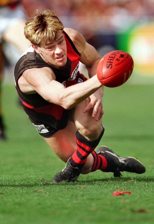 Mark Harvey, pictured playing his last game for Essendon in 1997.