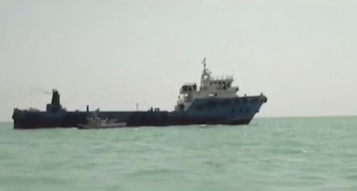 This undated image made from a video provided by the IRGC/IRIB shows a ship in the Persian Gulf. Iranian forces seized the ship, which it suspected of carrying smuggled fuel, state media reported Sunday, Aug. 4, 2019, marking the Revolutionary Guard's third seizure of a vessel in recent weeks and the latest show of strength by the paramilitary force amid a spike in regional tensions. 