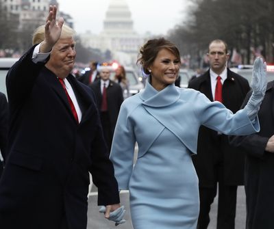 The First Lady shocked many when she attended the official Inauguration Day festivities in a powder blue double-face cashmere dress and coat by US designer Ralph Lauren. The choice was distinctly different from anything we have seen her wear before plus, it was reminiscent of styles worn by the former First Lady the late Jackie Kennedy Onassis.
