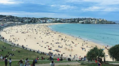 Yesterday's balmy conditions caused hundreds of Sydneysiders to flock to Bondi Beach for a swim in the 'winter heat'. (Instagram)